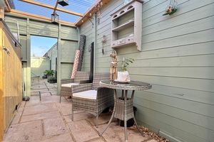 Rear Covered Courtyard- click for photo gallery
